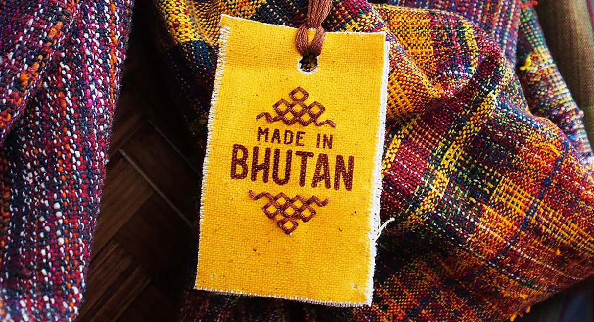 A textile tag with Made in Bhutan text